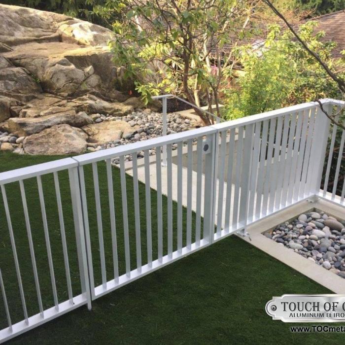  | This simple white fall protection guardrail was custom fabricated and installed to complement a luxury residential property in West Vancouver, This product was locally designed and manufactured in Surrey, BC. | Guardrails & Handrails 